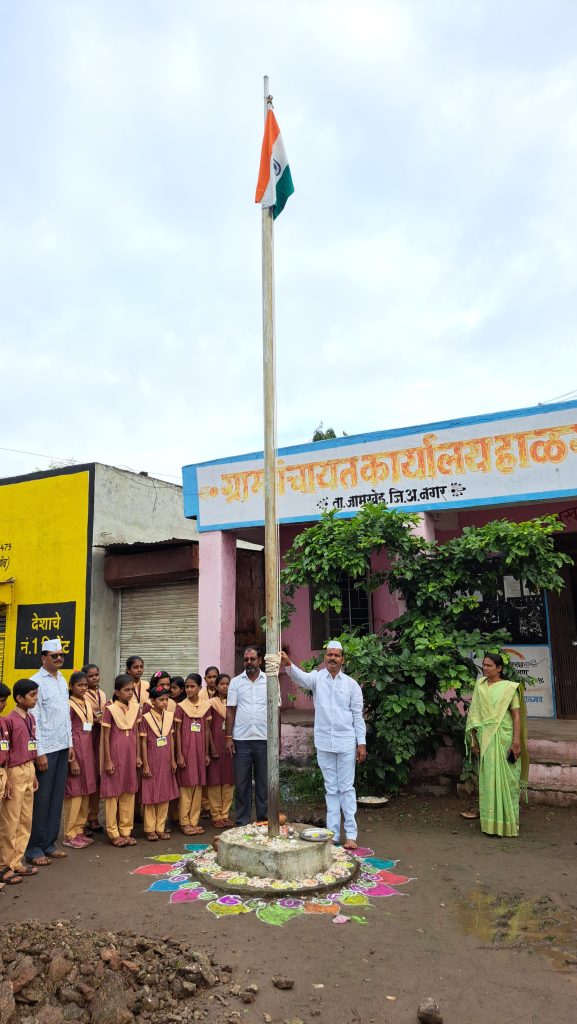 Flag hoisting by Abasaheb Dhavale in Halgaon